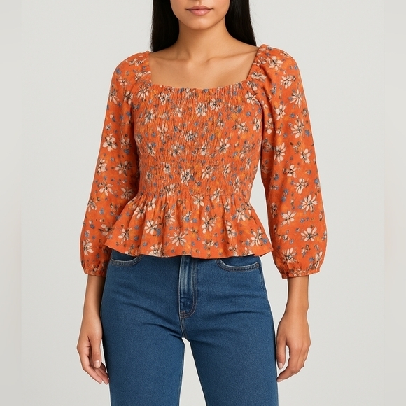 Nanette Lepore Tops - Nanette Lepore Floral Ruffled Smocked Peplum Blouse